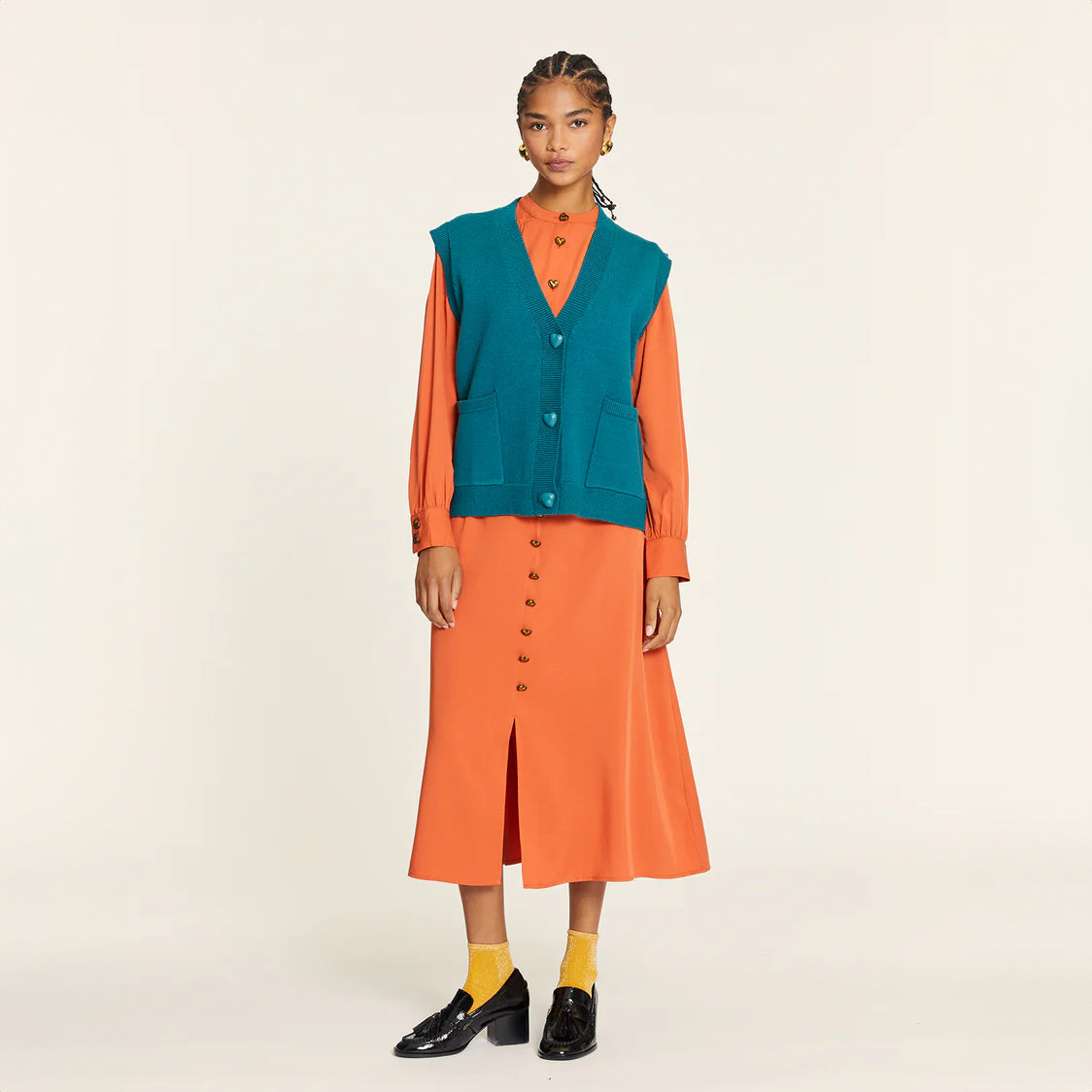 Green heart-buttoned knit vest