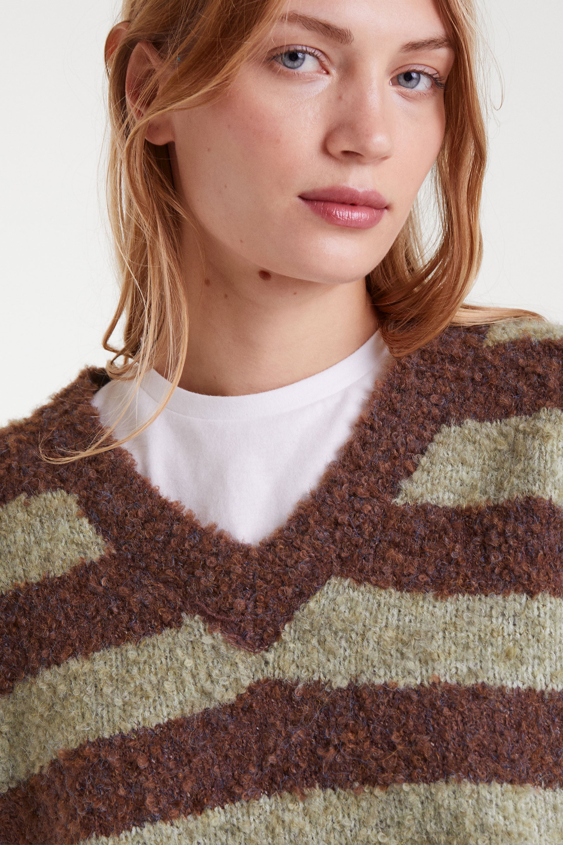 Brown and green striped sweater