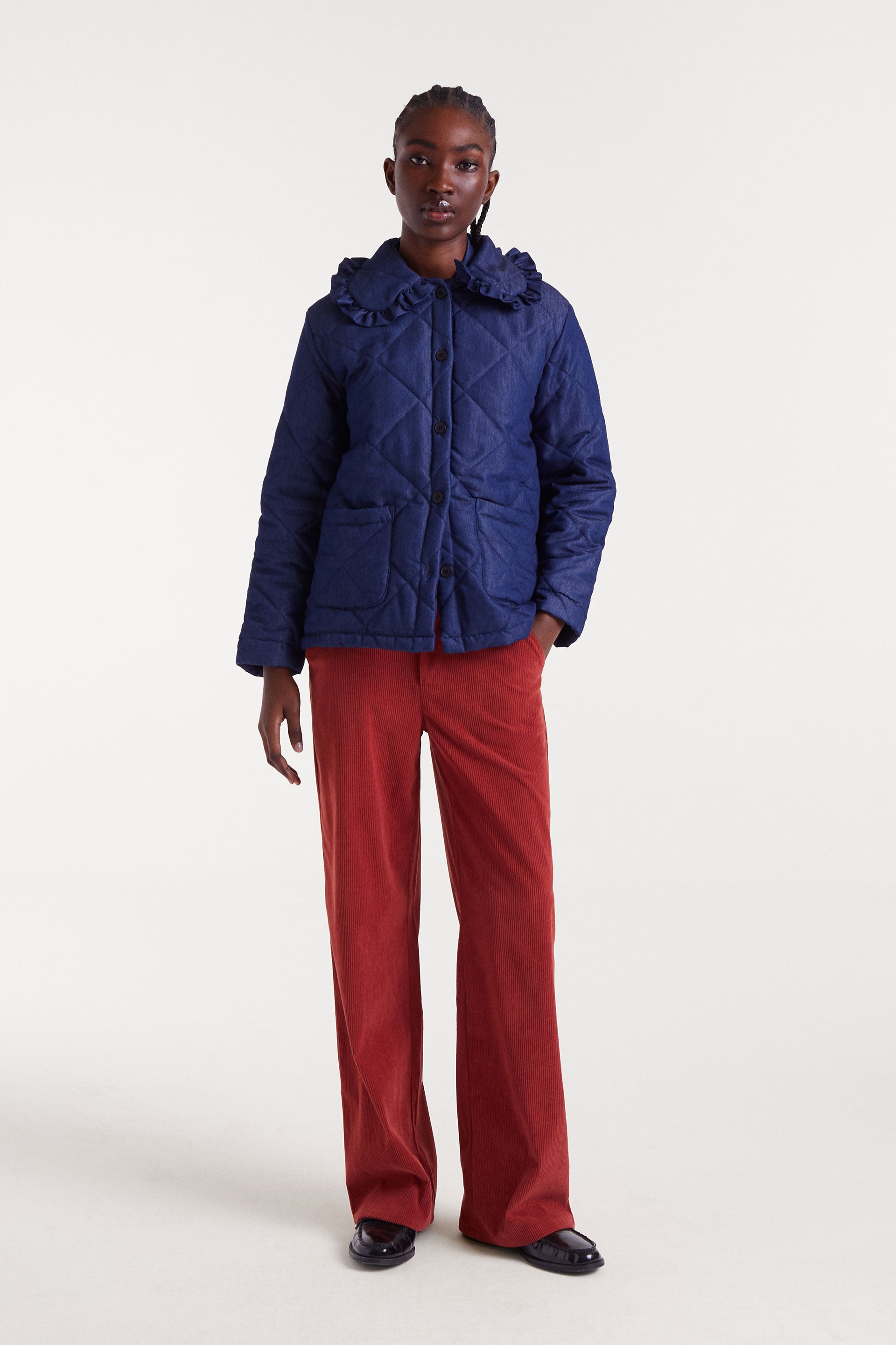 Chaqueta acolchada denim azul con cuello de volante