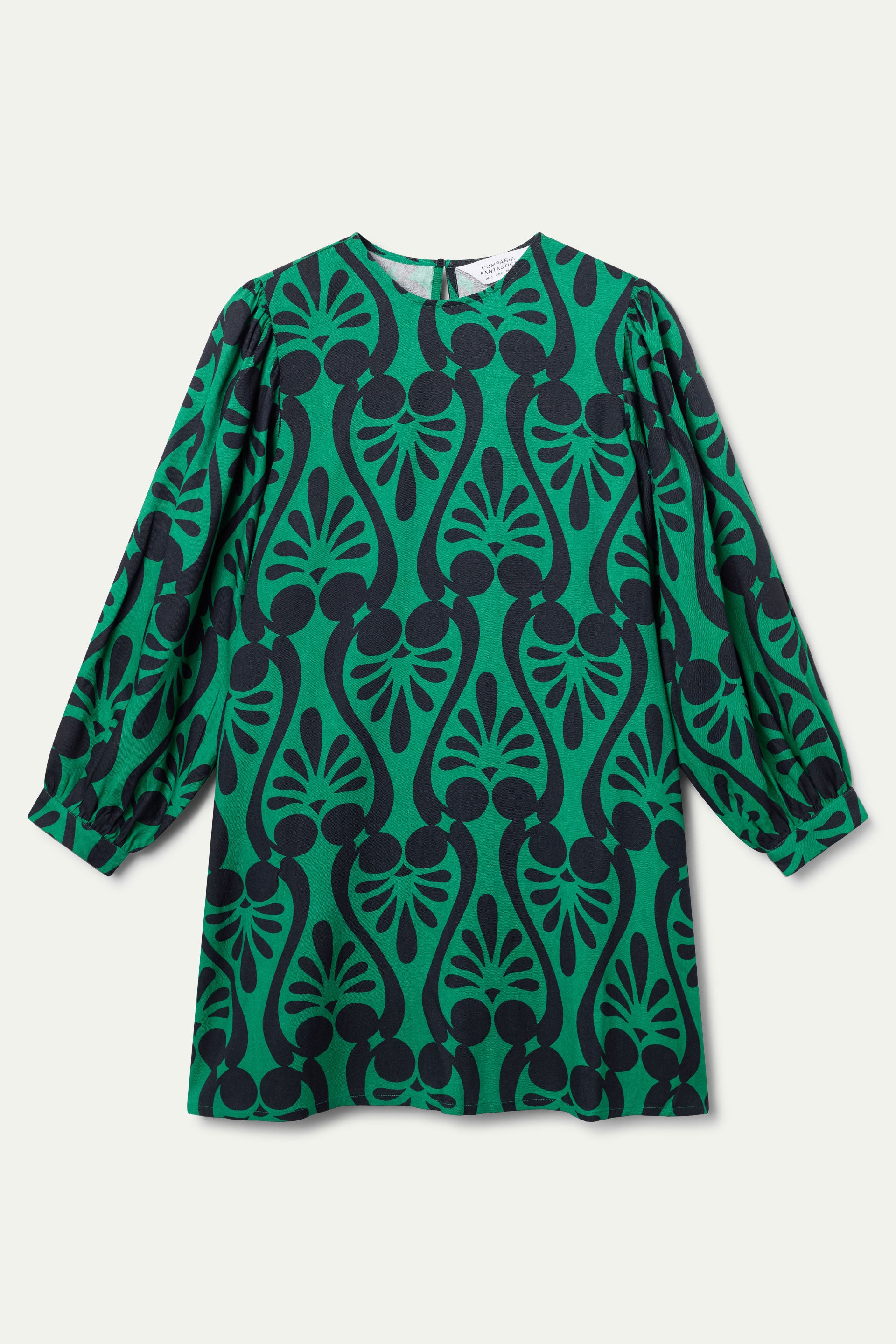 Vestido corto verde con estampado geométrico