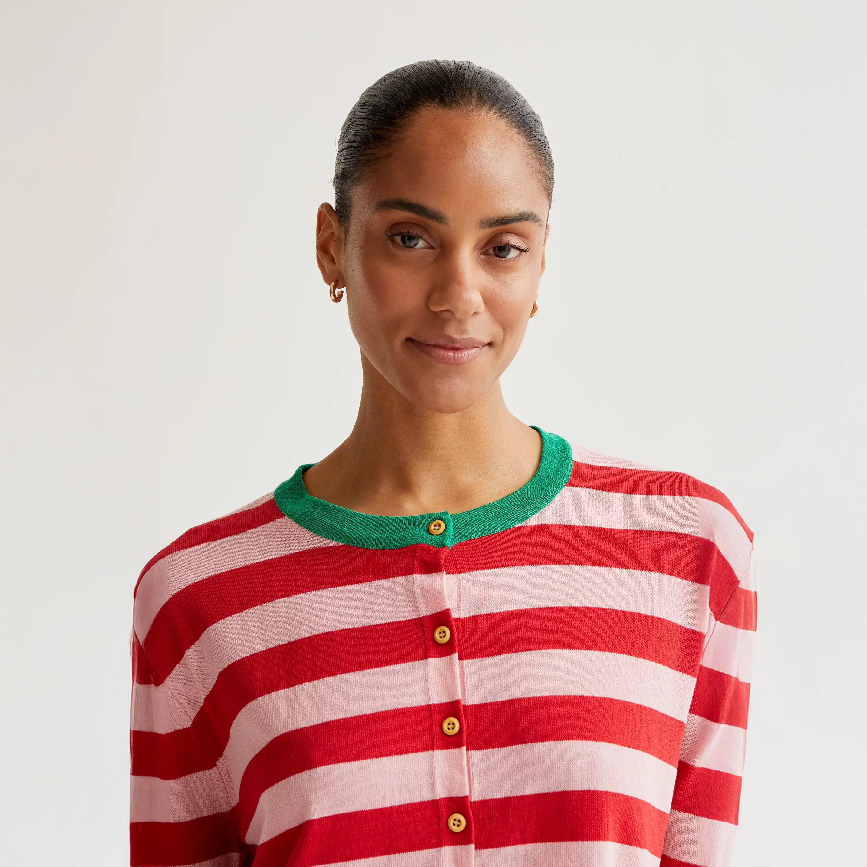 Soft knit cardigan with pink and red striped print