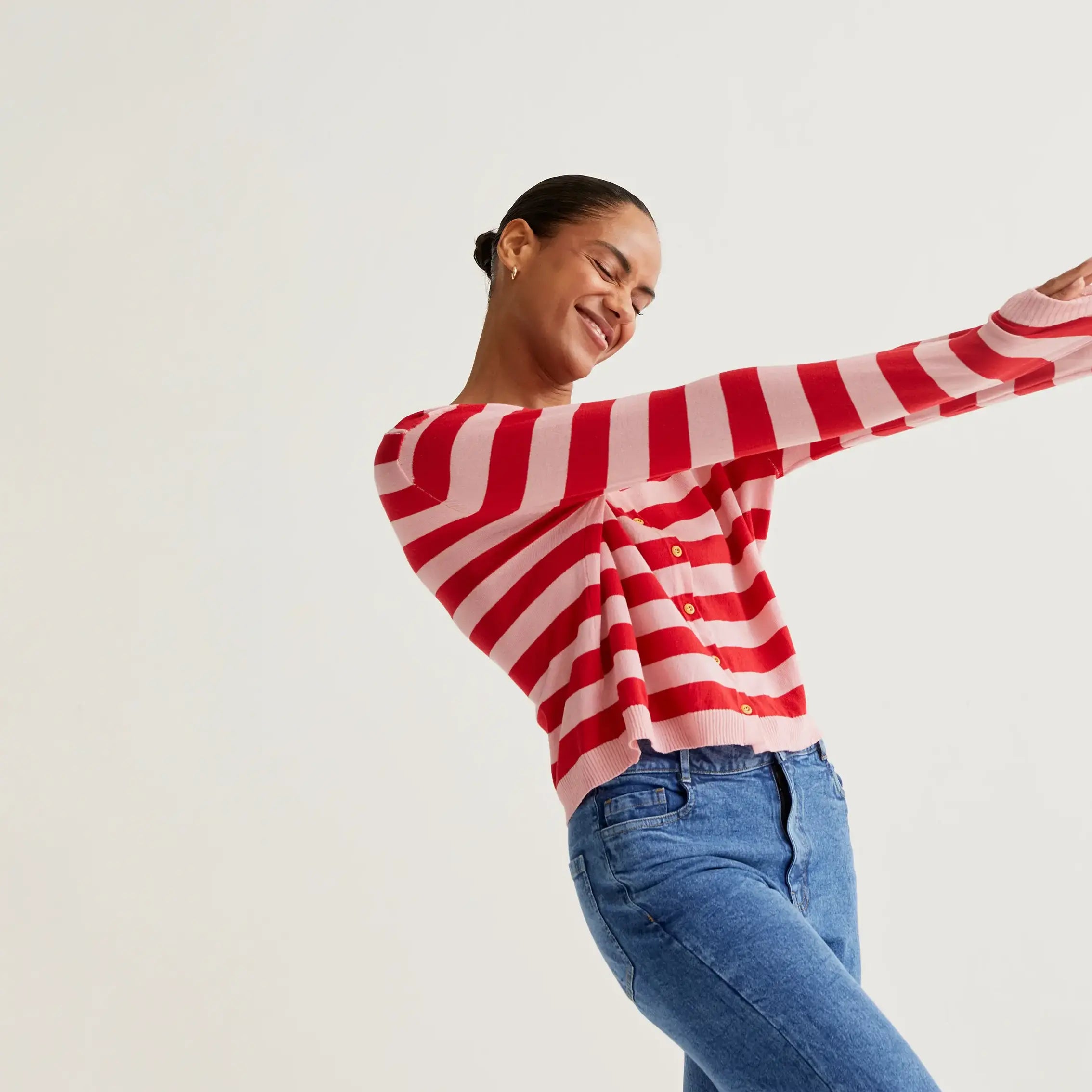 Soft knit cardigan with pink and red striped print