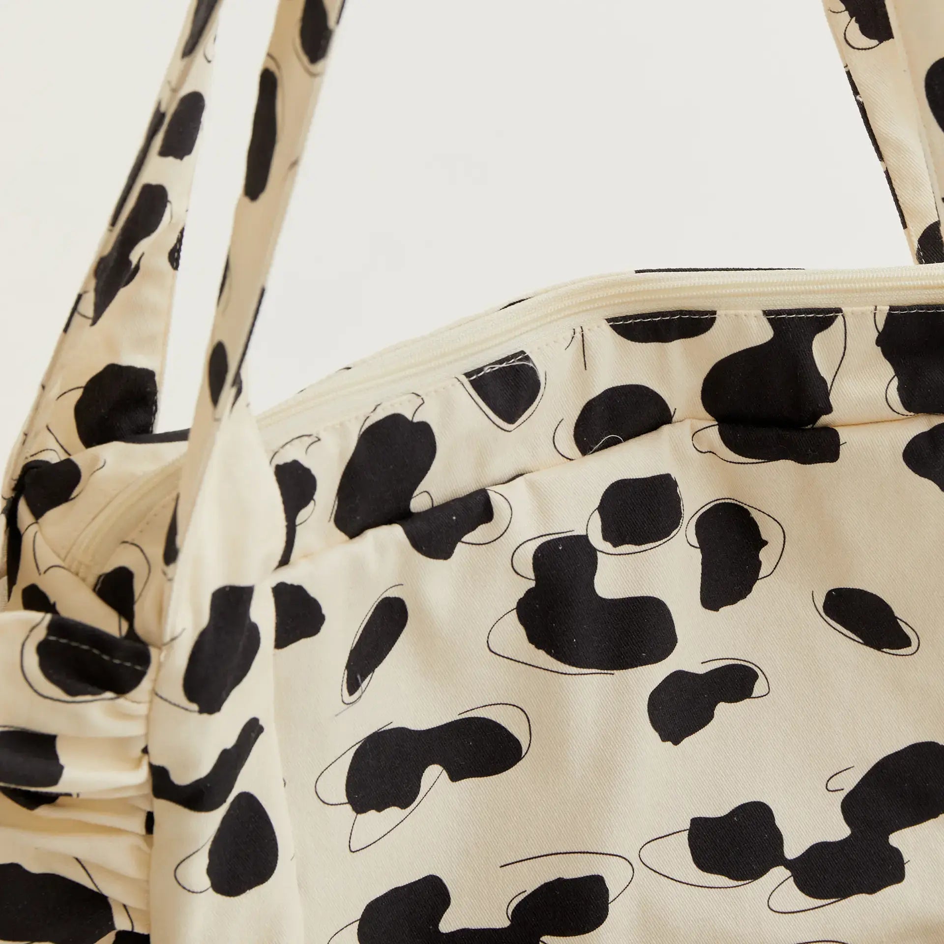 Bolso acolchado con estampado Dalmatian