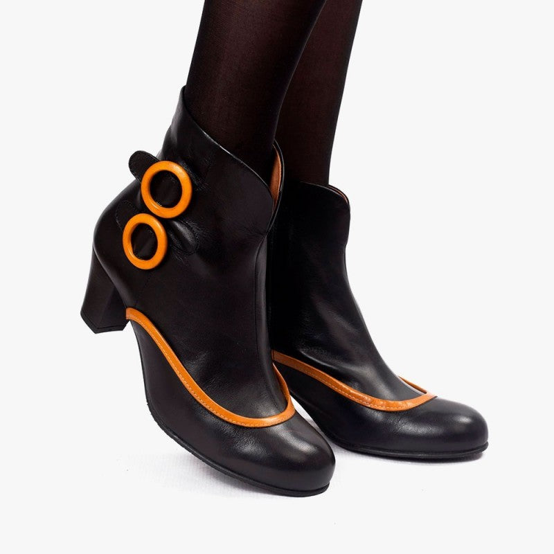 Ursula negro y mostaza