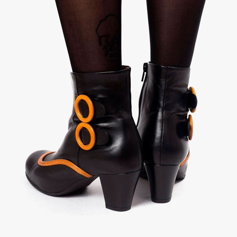 Ursula negro y mostaza