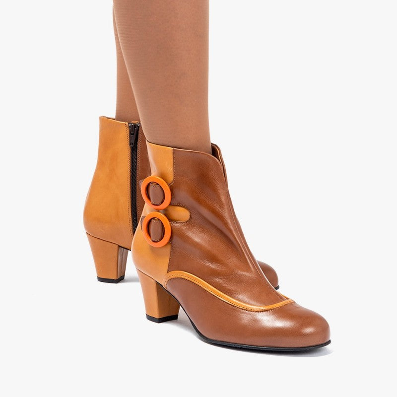 Úrsula marrón y mostaza