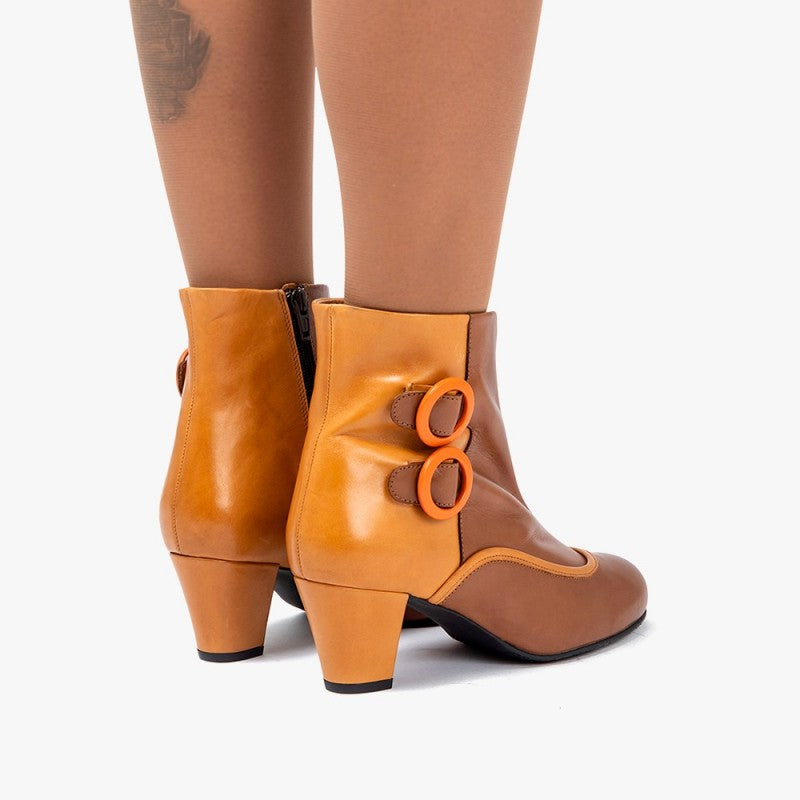 Úrsula marrón y mostaza