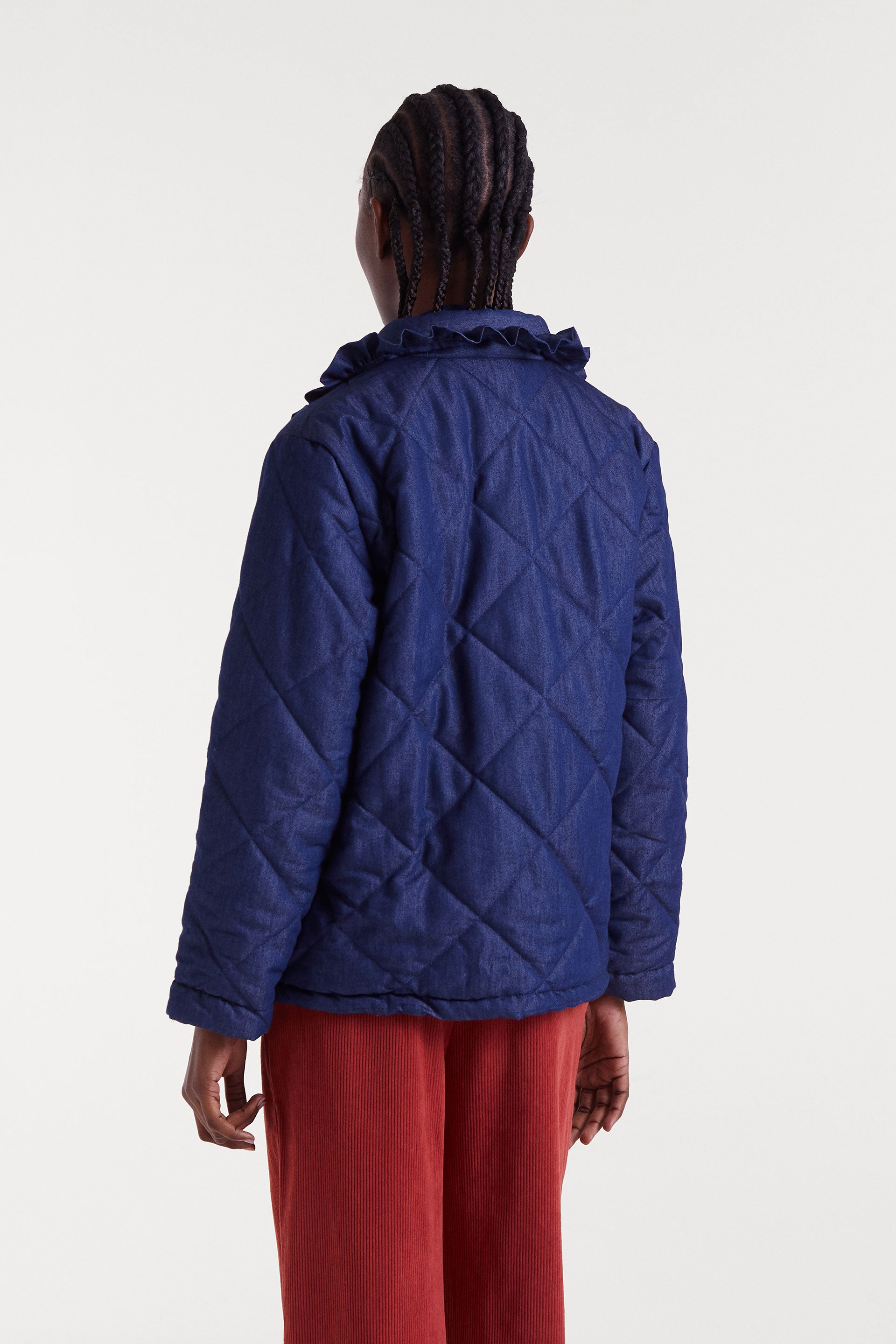 Chaqueta acolchada denim azul con cuello de volante