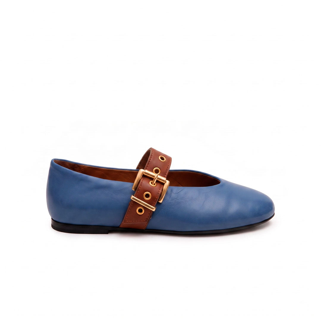 Nina azul cobalto y brandy
