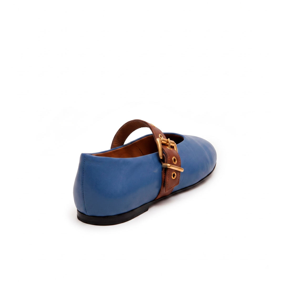 Nina azul cobalto y brandy